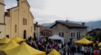 Mercatini di Natale 2025 nel borgo medievale a Bagnaria, con Villaggio di Babbo Natale e zampognari