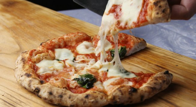 Pizza © Unsplash / Tadahiro Higuchi